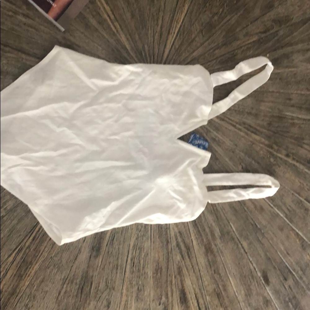 Ivory Free People onesie. NWT